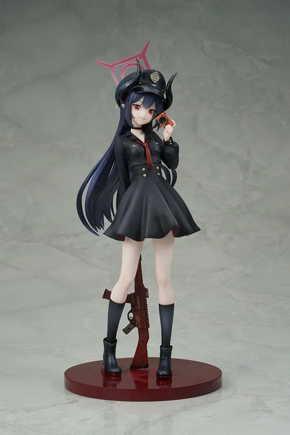 Blue Archive Chiaki 1/7 scale figure wearing dark uniform with long coat holding camera and rifle accessory.