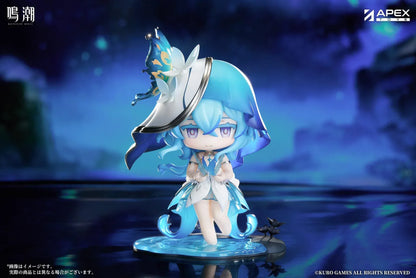 Chibi Shorekeeper Jinseki Series figure with blue hair, a butterfly-decorated headpiece, and a blue butterfly held in her hands, standing on a water-inspired base.