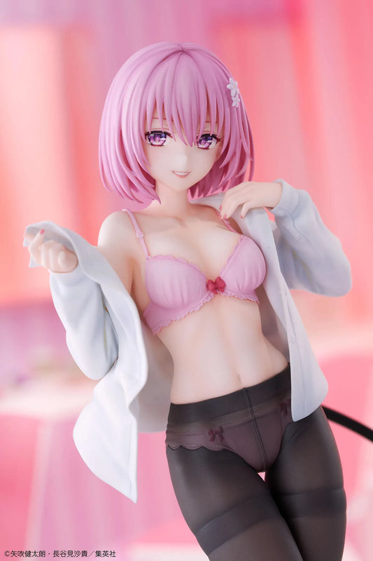 To Love-Ru Darkness Momo Belia Deviluke anniversary figure with pink hair, a white shirt, and a curved black tail on a gold heart-shaped “20” base.