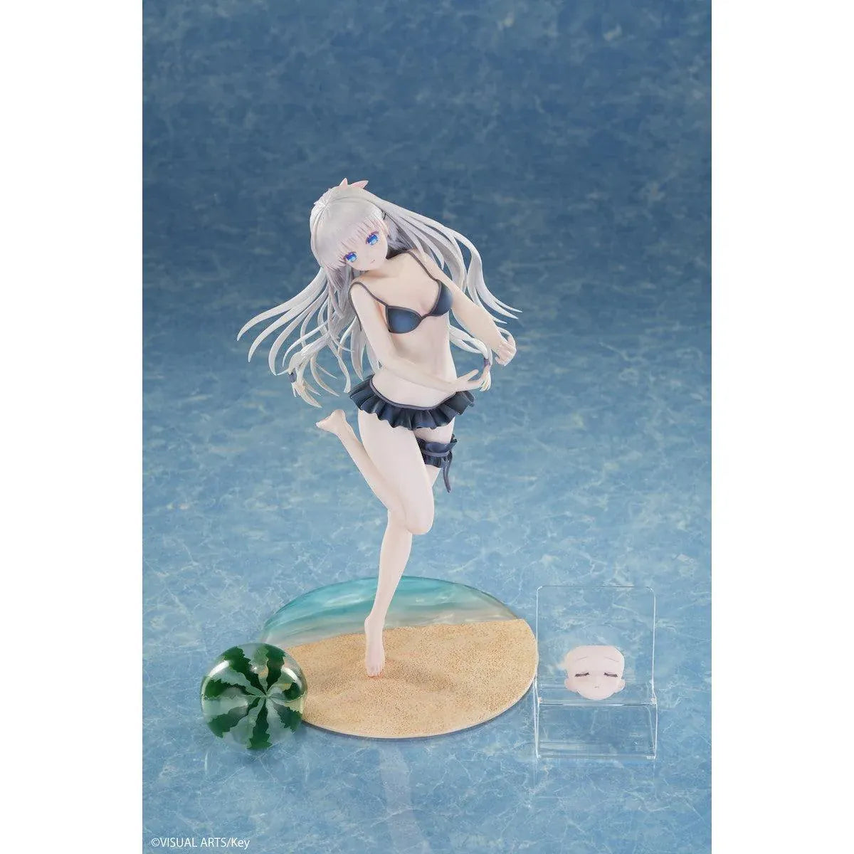 Summer Pockets REFLECTION BLUE Shiroha Naruse 1/6 scale figure wearing a black swimsuit and holding a watermelon on a beach-themed base.