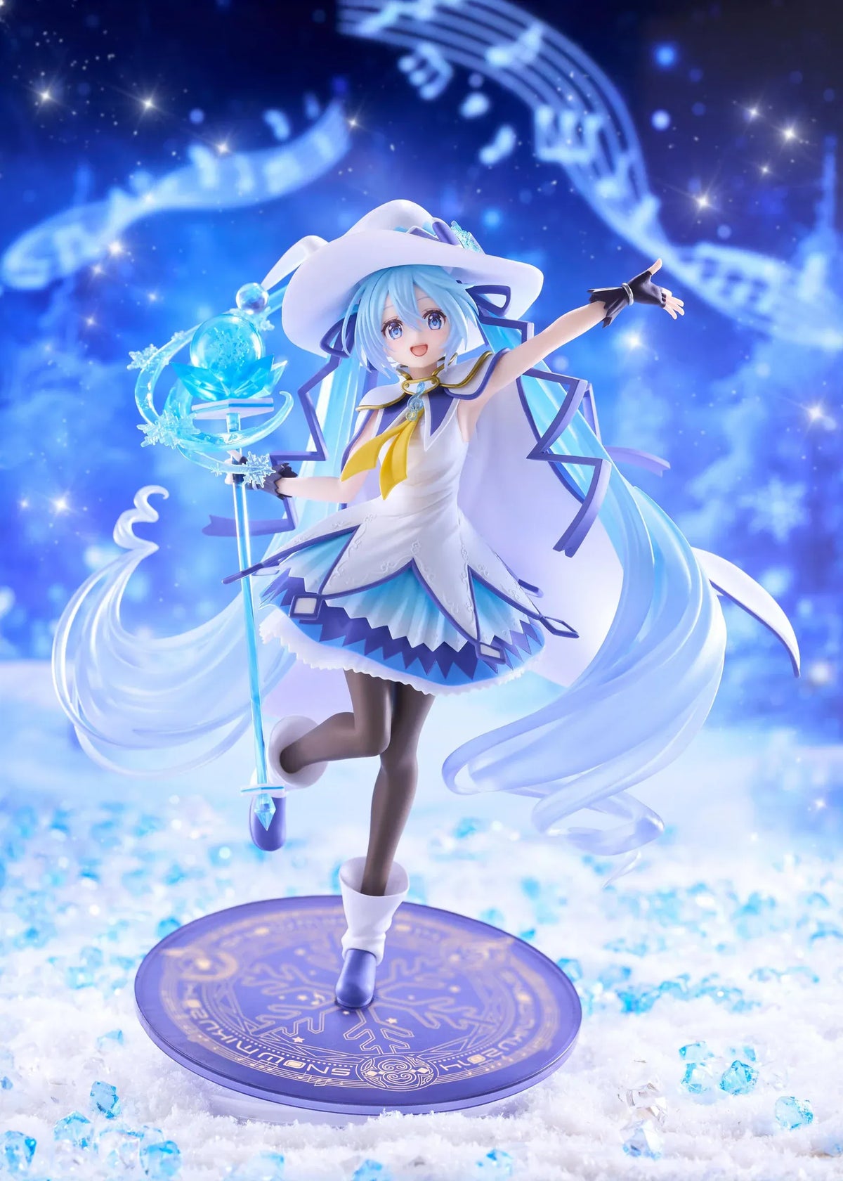 Snow Miku All Stars 2014 Ver. AMP+ figure wearing a white-and-blue snow sorceress outfit and holding a translucent magical staff.