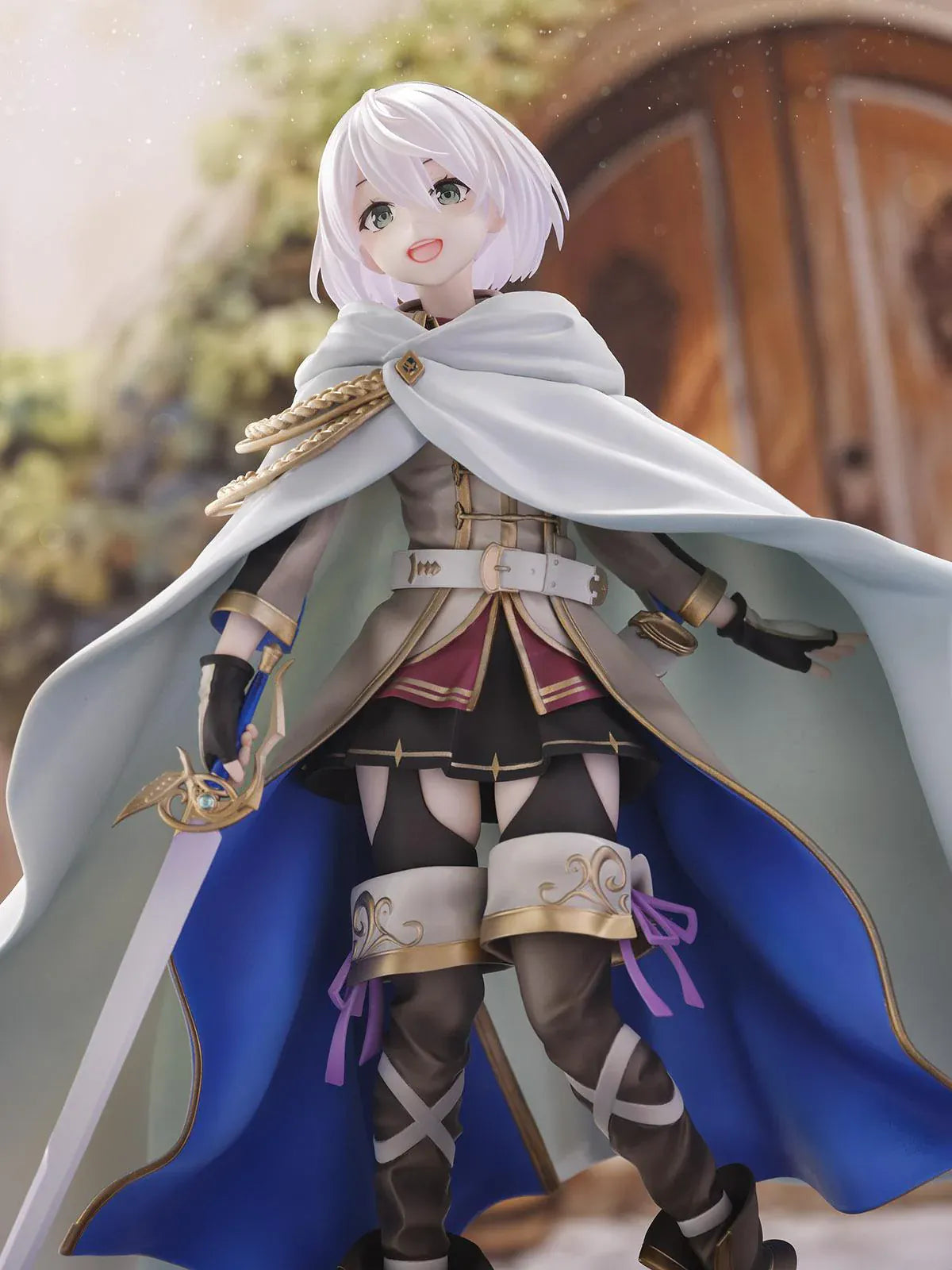 Wandering Witch The Journey of Elaina Amnesia 1/7 Scale Figure featuring Amnesia with short silver hair, white cape, sword, and stone-style display base.