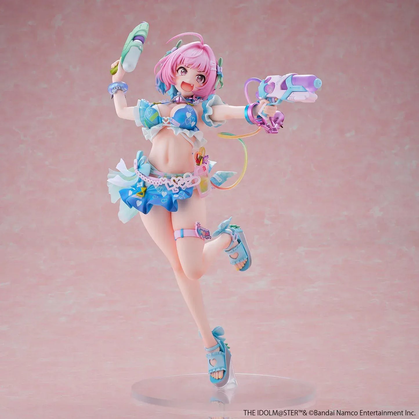 Riamu Yumemi 1/6 scale figure from The Idolmaster Cinderella Girls in pastel blue idol outfit holding water gun accessory on clear display base