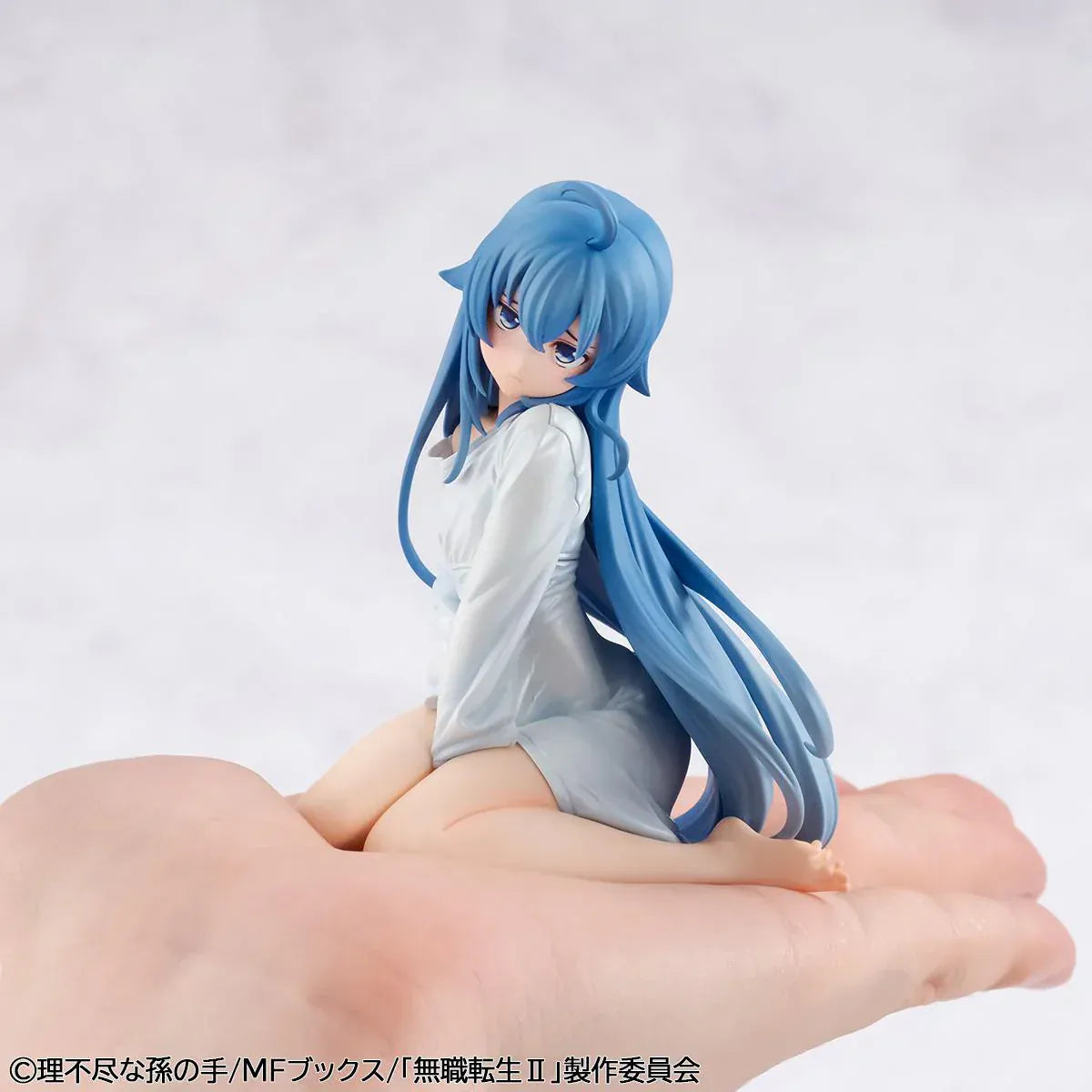 Mushoku Tensei Melty Princess Roxy Migurdia Peeping Ver. figure kneeling in oversized white shirt with long blue hair.