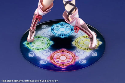 Tales of Xillia Milla Maxwell 1/8 scale figure holding a sword in a battle pose on a colorful elemental display base.