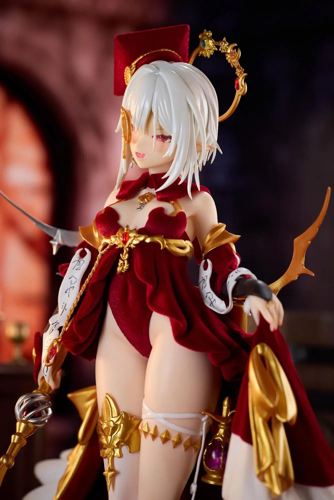 Alchemist Formal Dress Ver. 1/7 Scale Figure featuring a white-haired character in a red formal dress with gold accessories, ornate staff, cape, and red display base.