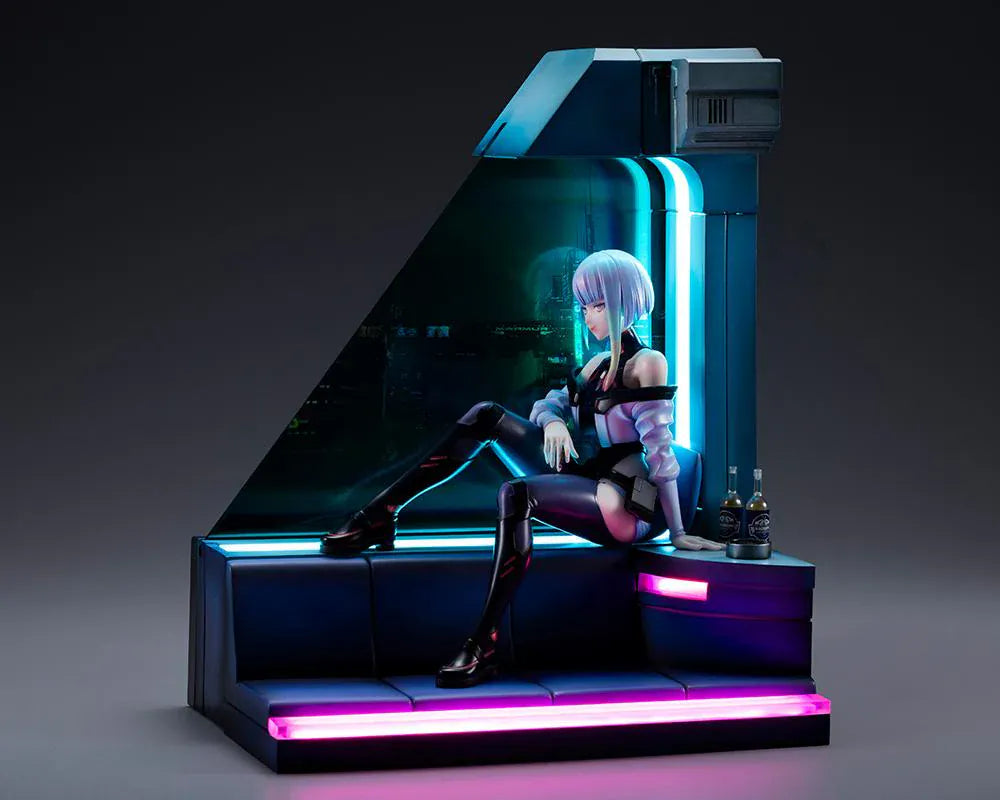 Cyberpunk Edgerunners Lucy 1/7 Scale Figure seated on a cyberpunk diorama base with blue translucent panel and neon details
