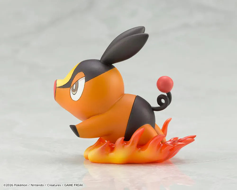 Pokemon ArtFX J Hilda with Tepig 1/8 Scale Figure Rerun featuring Hilda in her trainer outfit holding a Poké Ball with Tepig and flame effect on a display base.