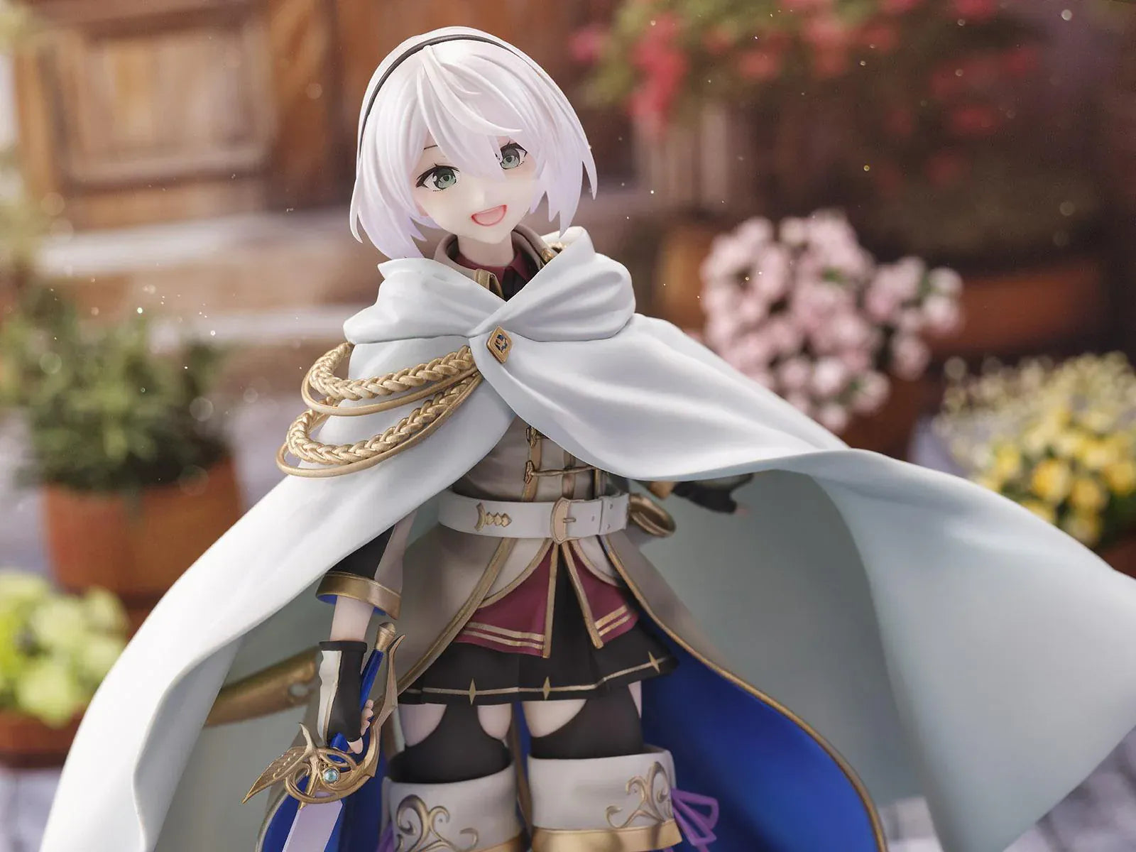 Wandering Witch The Journey of Elaina Amnesia 1/7 Scale Figure featuring Amnesia with short silver hair, white cape, sword, and stone-style display base.