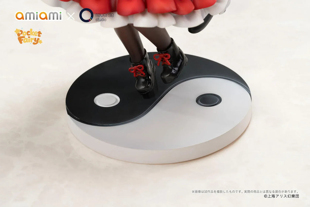 Touhou Project Pocket Reimu Hakurei figure holding a purification rod and ofuda talisman on a black-and-white yin-yang base.