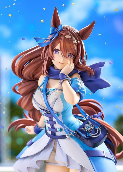 Umamusume Cinderella Gray Super Creek figure with flowing brown hair, a blue and white outfit, shoulder bag, and tall boots, posed with a hand against her cheek.