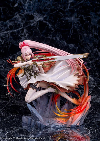 Tales of Arise Shionne 1/7 Scale Figure featuring a pink-haired anime character with blue eyes, an ornate white battle dress, gold armor, and lace stockings, aiming a detailed rifle while suspended in a dynamic pose surrounded by translucent red and orange effects on a rocky display base.