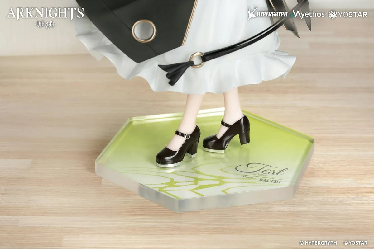 Kal'tsit The Remains of Time Ver. figure wearing a flowing black and white maid dress and holding a serving tray on a translucent green base.