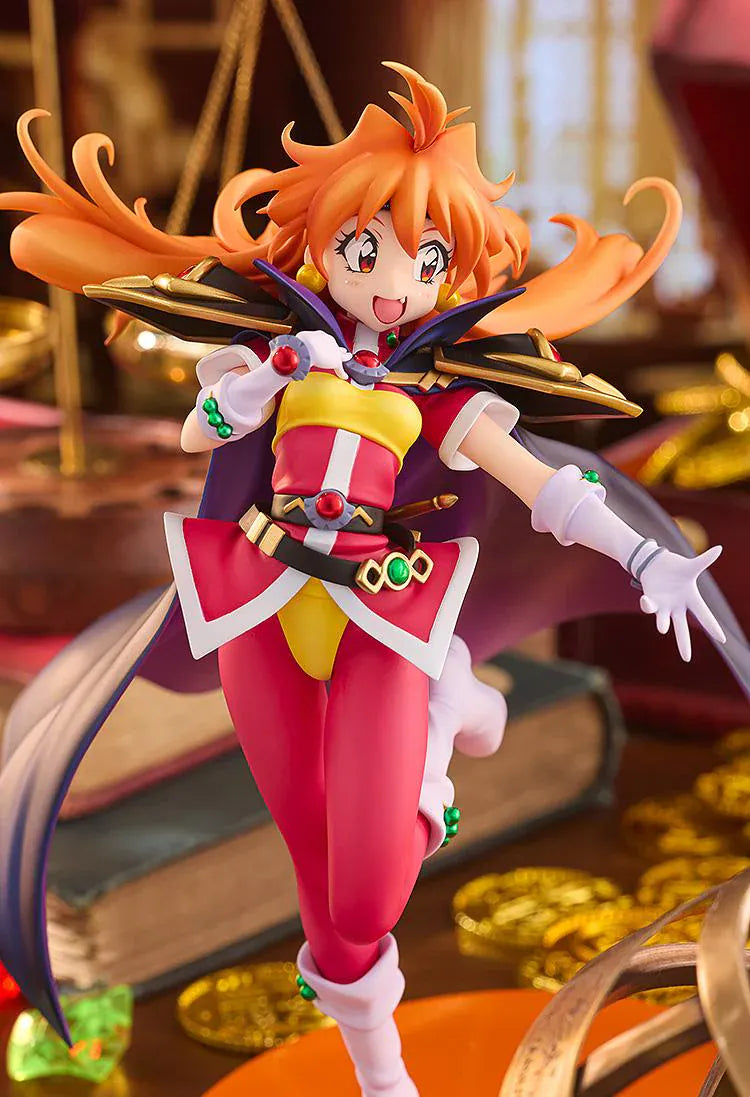 Slayers Lina Inverse Light Novel Non-scale Figure featuring Lina with bright orange hair, red and yellow outfit, black cape, white boots, and an energetic fantasy pose.