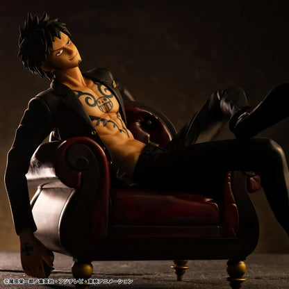 One Piece Portrait Of Pirates S.O.C. Trafalgar Law Ver. R Figure wearing a black suit and sitting in a red armchair