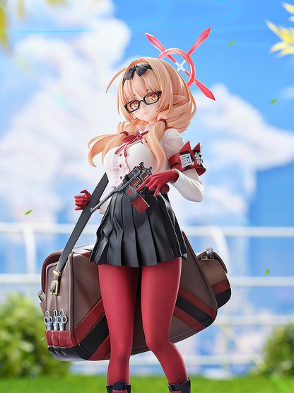Blue Archive Chinatsu 1/7 Scale Figure featuring Chinatsu with pink hair, glasses, red gloves, halo detail, weapon accessory, and a large bag.