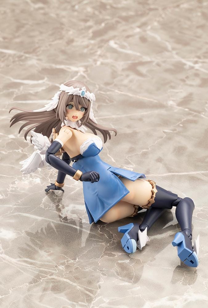 Assembled Arcanadea Ermeda model kit with long brown hair, white feathered wings, a blue and white outfit, gold armor accents, and armored boots.