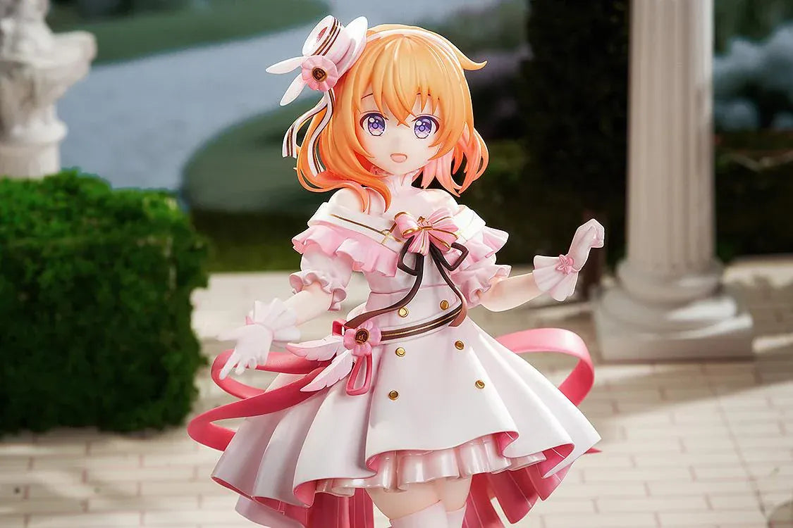 Is the Order a Rabbit Cocoa Dress Ver. 1/7 Scale Figure wearing an elegant pink and white frilled dress with ribbons and floral accessories