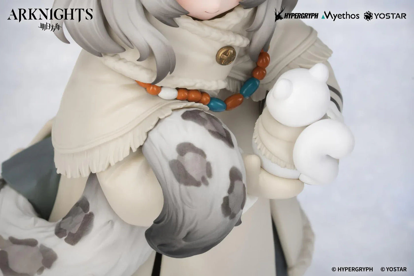 Arknights Rhodes Kids Series Pramanix Non Scale Figure with white hair, animal ears, winter coat, fluffy cape, boots, and bear accessory