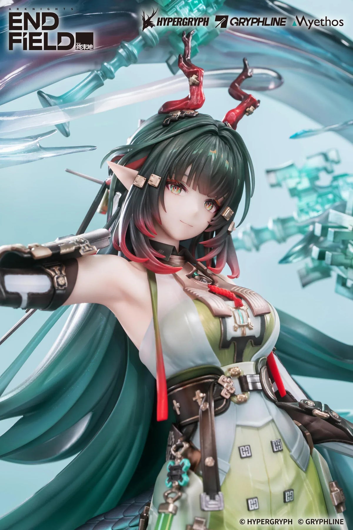 Arknights Endfield Zhuang Fangyi 1/7 scale figure with teal hair and a green outfit, surrounded by a curling dragon and translucent turquoise blades.