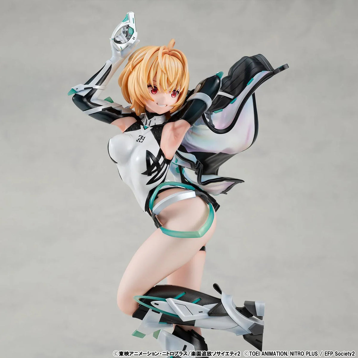 Lucrea Gabriel figure with golden hair, red eyes, black and white futuristic armor, turquoise accents, and a flowing iridescent-lined jacket.