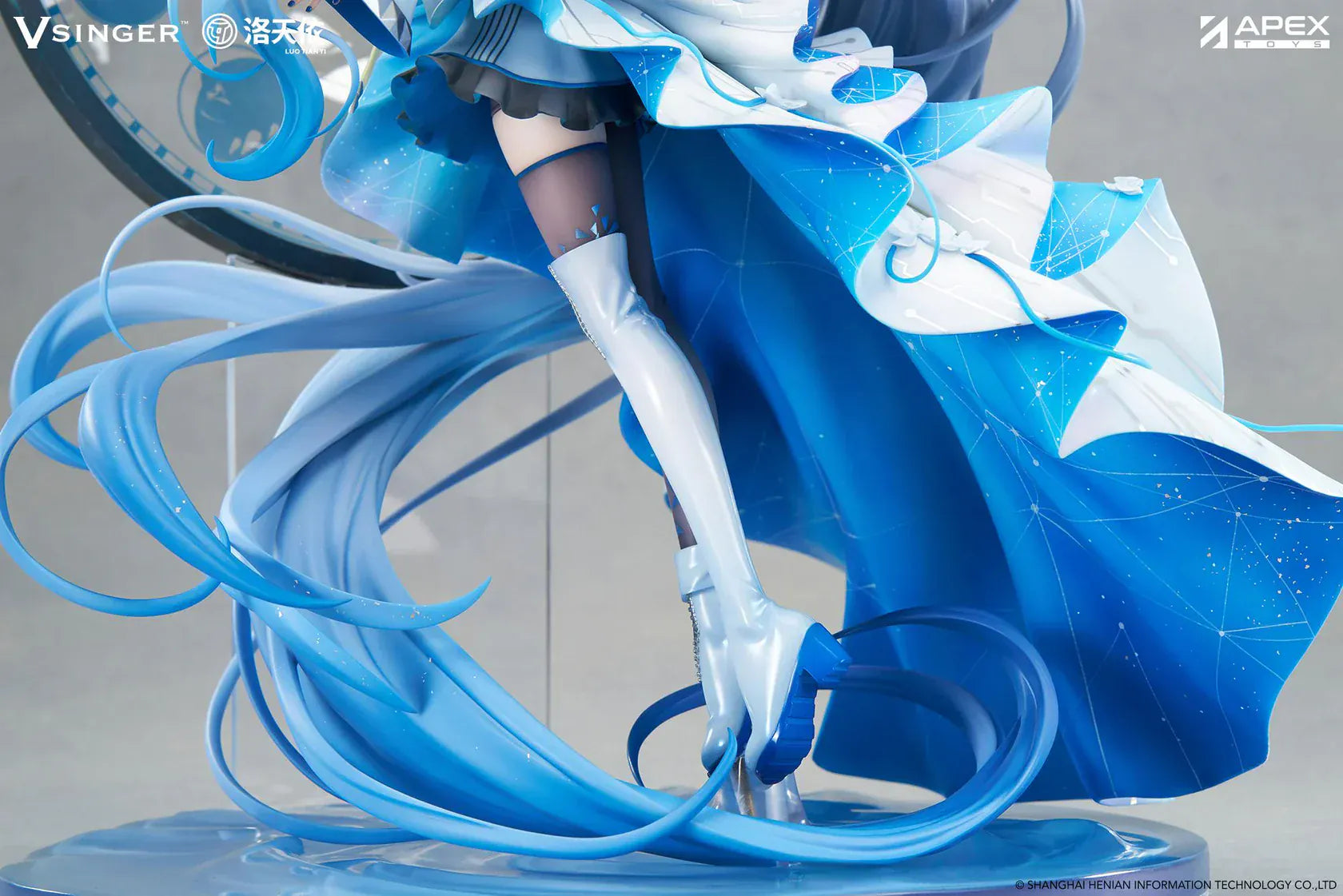 Vsinger Luo Tianyi 12th Anniversary 1/7 scale figure featuring flowing twin tails, layered blue and white dress, and ornate circular backdrop