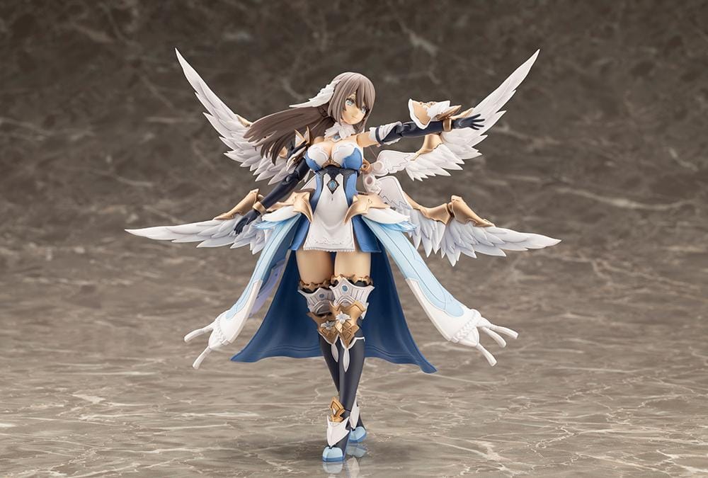 Assembled Arcanadea Ermeda model kit with long brown hair, white feathered wings, a blue and white outfit, gold armor accents, and armored boots.