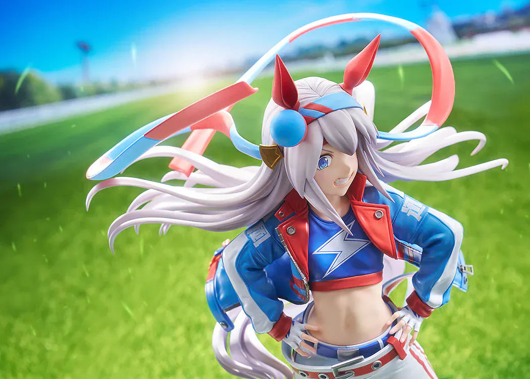 Uma Musume: Cinderella Gray Tamamo Cross 1/7 Scale Figure featuring Tamamo Cross in her vibrant blue and red racing jacket with confident pose and long flowing twin tails.