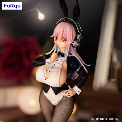 Super Sonico Tailcoat Ver. figure with pink hair, silver headphones, black bunny ears, a black and white outfit, and patterned stockings.