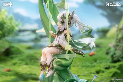 Genshin Impact Nahida Physic of Purity Ver. 1/7 scale figure seated on a green swing surrounded by vines, leaves, and colorful flowers.