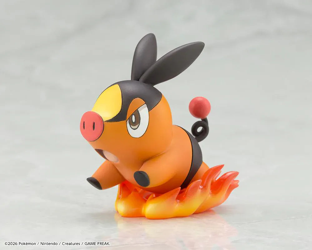 Pokemon ArtFX J Hilda with Tepig 1/8 Scale Figure Rerun featuring Hilda in her trainer outfit holding a Poké Ball with Tepig and flame effect on a display base.