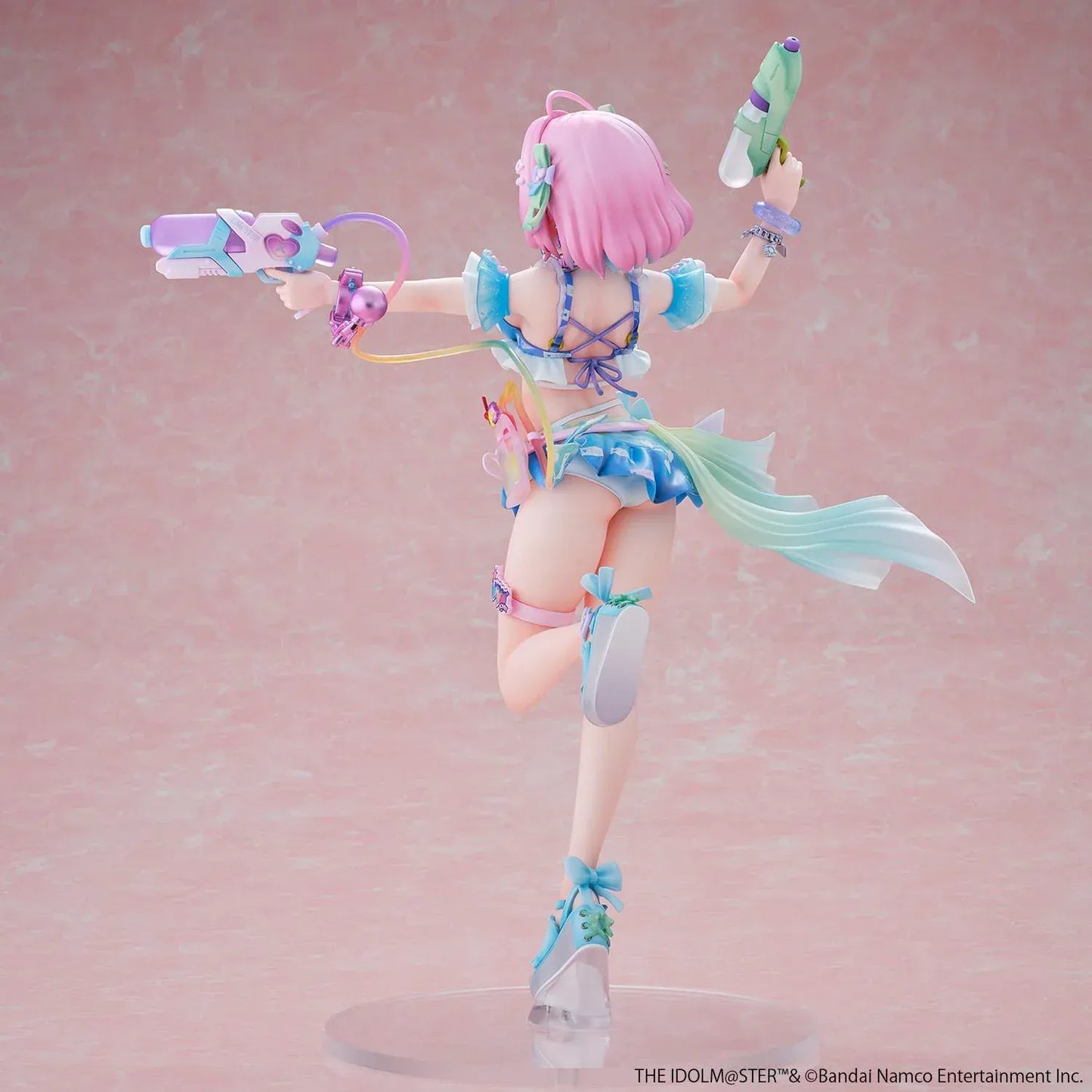 Riamu Yumemi 1/6 scale figure from The Idolmaster Cinderella Girls in pastel blue idol outfit holding water gun accessory on clear display base