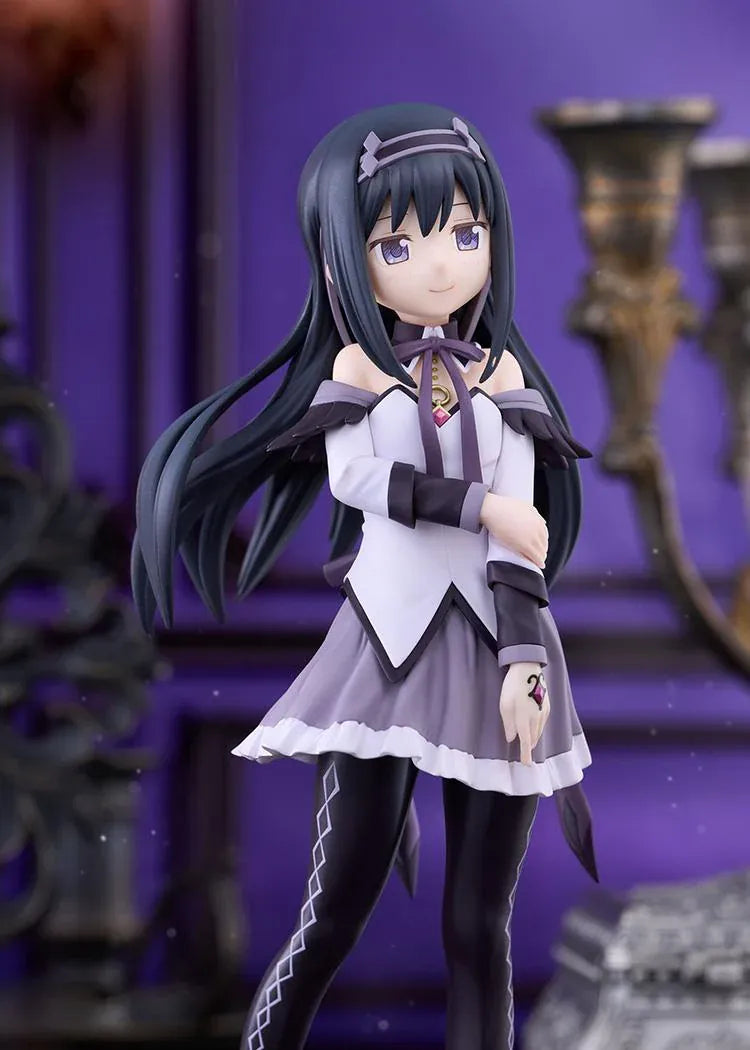 Homura Akemi figure with long black hair, violet eyes, a white and purple outfit, and diamond-patterned stockings, smiling with one hand resting on her arm.