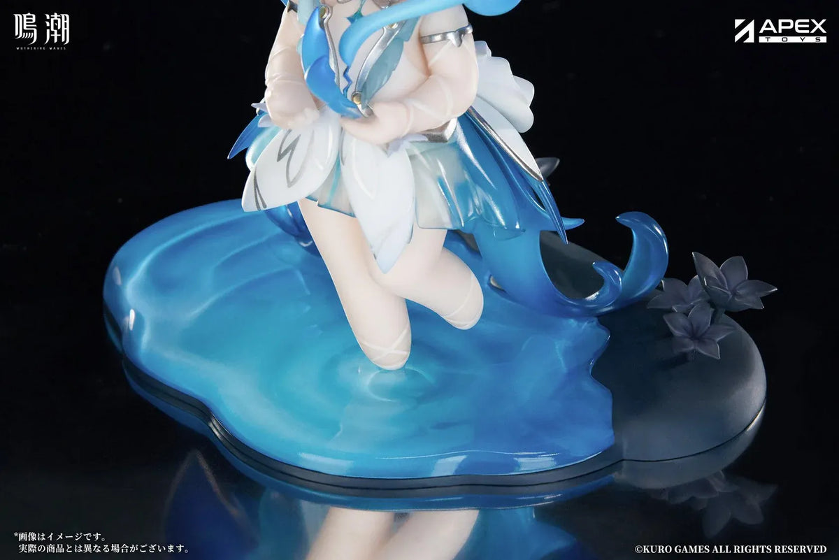 Chibi Shorekeeper Jinseki Series figure with blue hair, a butterfly-decorated headpiece, and a blue butterfly held in her hands, standing on a water-inspired base.
