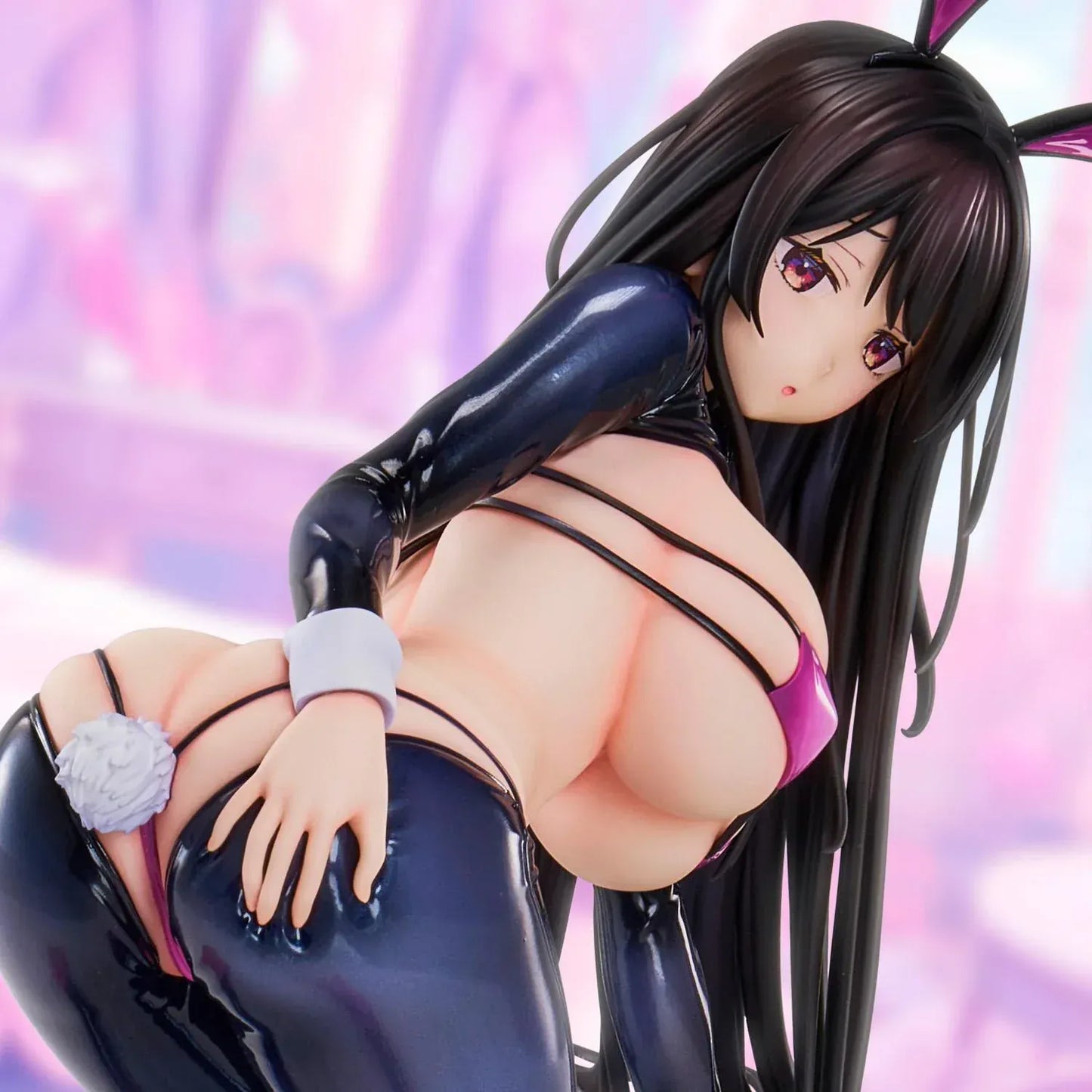 Reverse Bunny anime figure based on a Hirari illustration, posed low to the ground in a glossy dark bunny suit with long flowing hair and pink heels.
