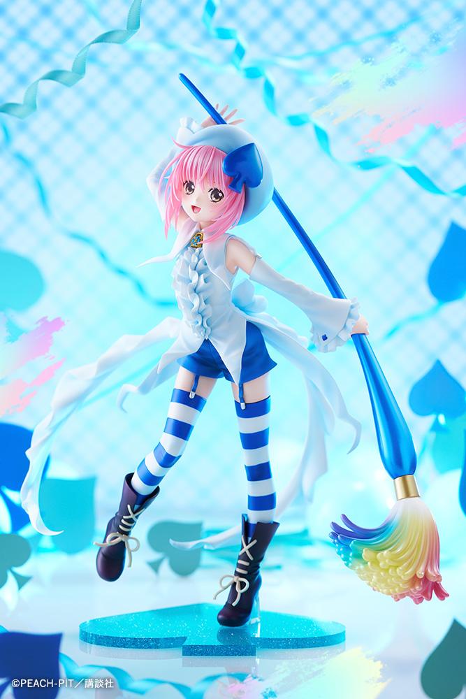 Amulet Spade 1/7 scale figure with pink hair, a white-and-blue costume, striped stockings, and an oversized rainbow-tipped paintbrush.