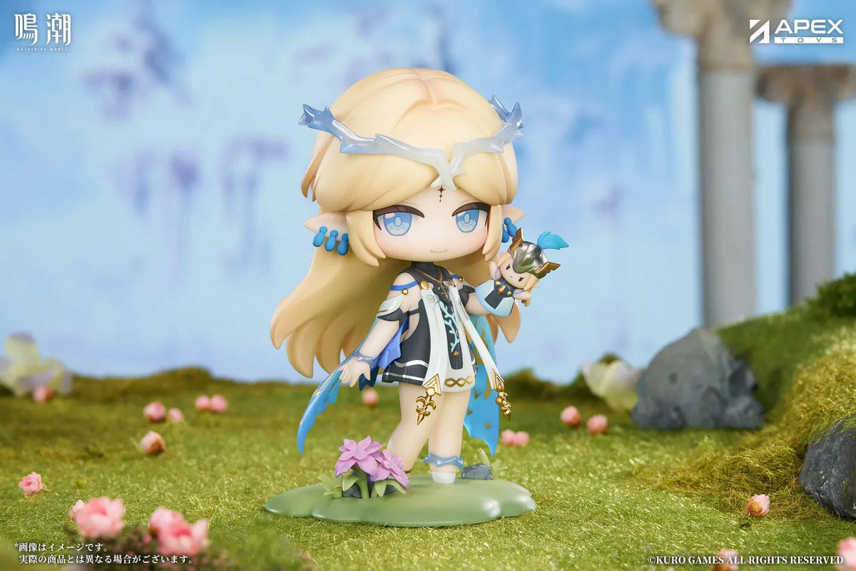 Chibi Cartethyia Jinseki Series figure with blonde hair, blue eyes, a pale blue headpiece, and a small armored companion, standing on a green floral base.