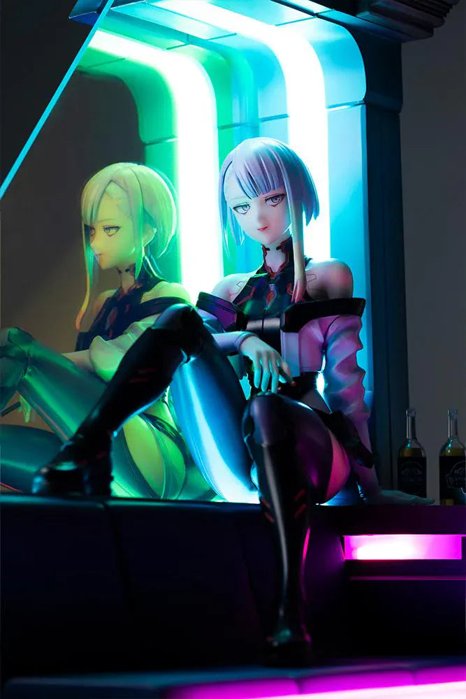 Cyberpunk Edgerunners Lucy 1/7 Scale Figure seated on a cyberpunk diorama base with blue translucent panel and neon details