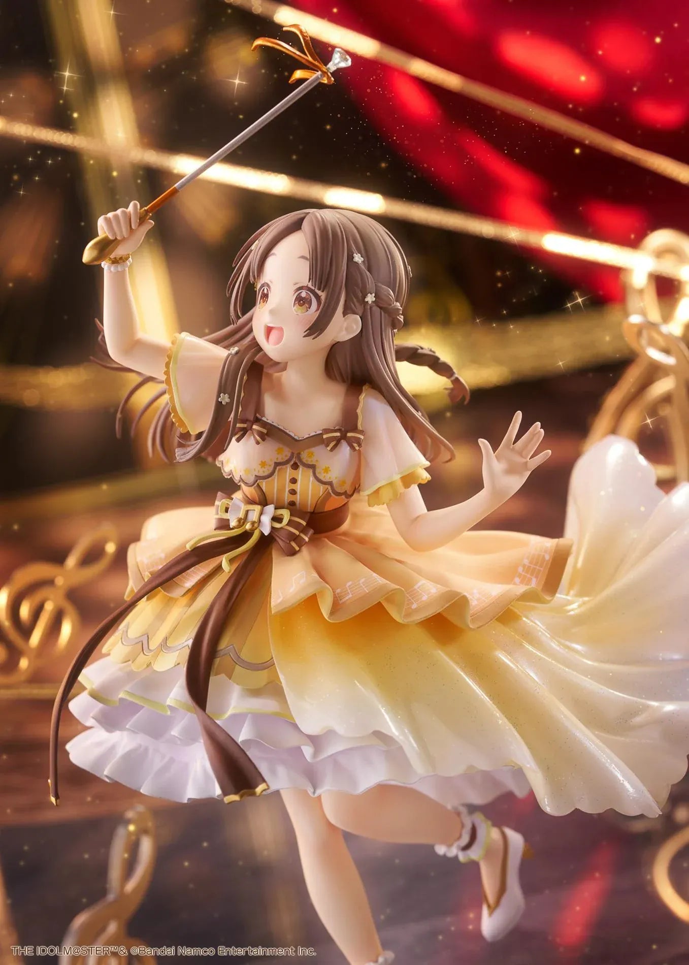 The Idolmaster Gakuen China Kuramoto 1/7 scale anime figure in a flowing yellow stage dress holding a microphone
