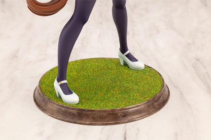 Umamusume Pretty Derby King Halo 1/7 scale figure wearing a green-and-white race outfit on a grassy display base.