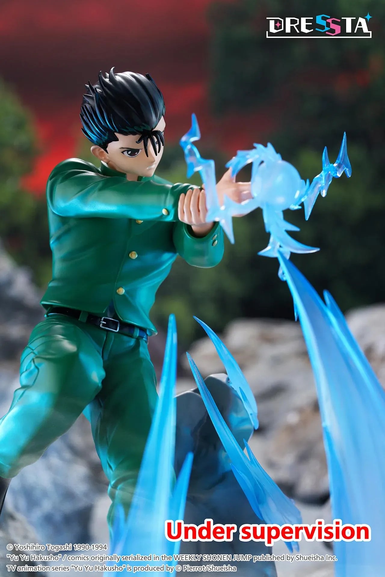 Yu Yu Hakusho Dressta Yusuke Urameshi Figure in green school uniform with blue spirit energy effect and rocky display base