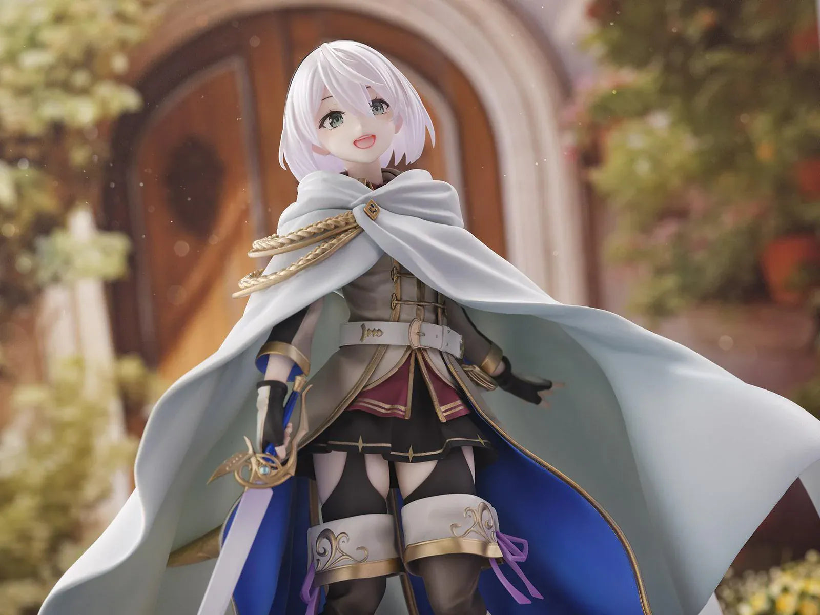 Wandering Witch The Journey of Elaina Amnesia 1/7 Scale Figure featuring Amnesia with short silver hair, white cape, sword, and stone-style display base.
