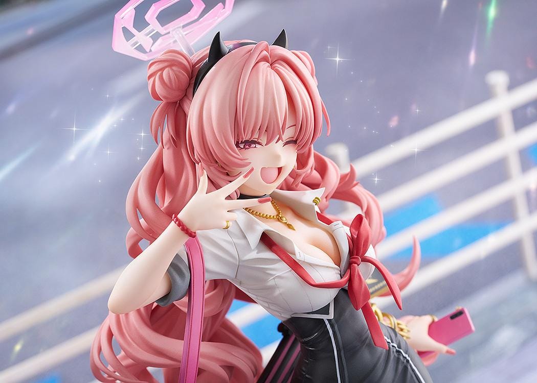 Blue Archive Kirara 1/7 scale figure with long pink hair, school uniform, pink and black weapon, halo, and translucent pink display base