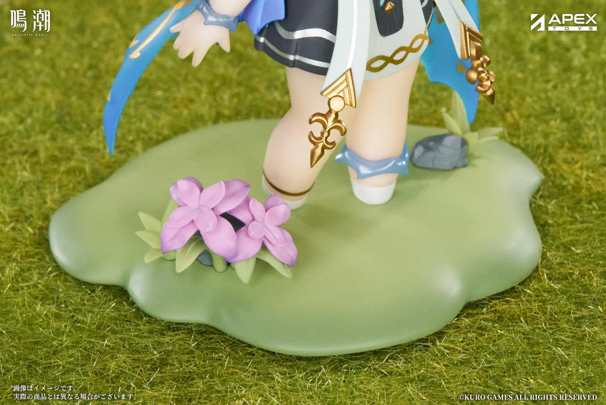 Chibi Cartethyia Jinseki Series figure with blonde hair, blue eyes, a pale blue headpiece, and a small armored companion, standing on a green floral base.