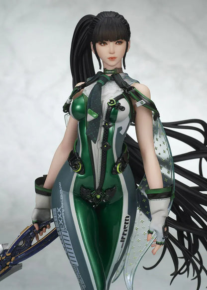 Stellar Blade Eve non-scale figure in a futuristic green and gray combat suit holding a long sword with flowing black hair