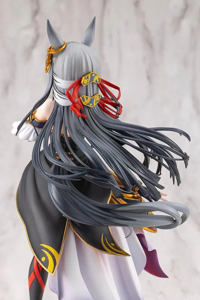Umamusume Pretty Derby Chrono Genesis 1/7 Scale Figure featuring a silver-gray-haired horse girl with blue eyes, horse ears, and a flowing white, black, red, and gold racing outfit standing on a grassy display base.