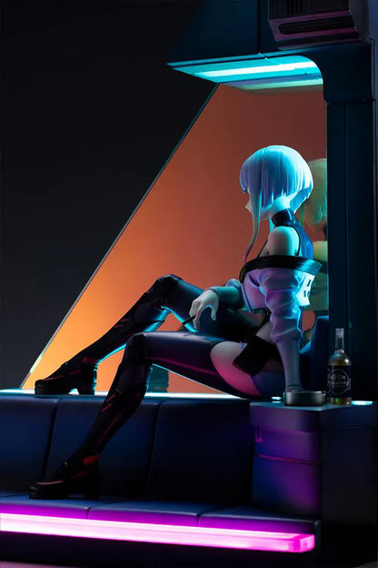 Cyberpunk Edgerunners Lucy 1/7 Scale Figure seated on a cyberpunk diorama base with blue translucent panel and neon details