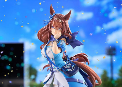 Umamusume Cinderella Gray Super Creek figure with flowing brown hair, a blue and white outfit, shoulder bag, and tall boots, posed with a hand against her cheek.