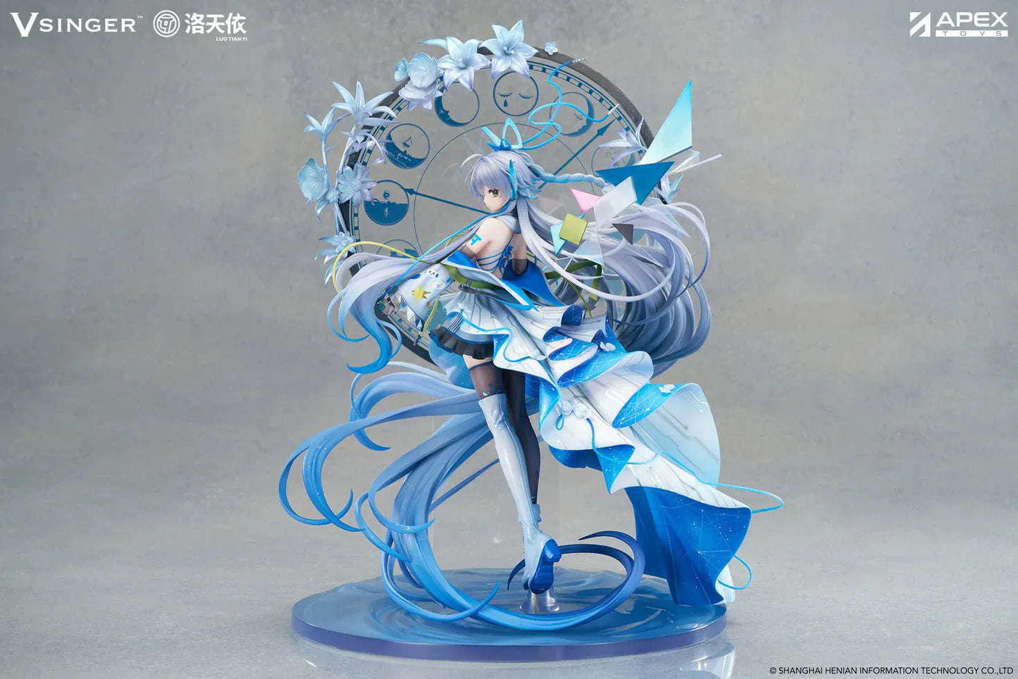 Vsinger Luo Tianyi 12th Anniversary 1/7 scale figure featuring flowing twin tails, layered blue and white dress, and ornate circular backdrop