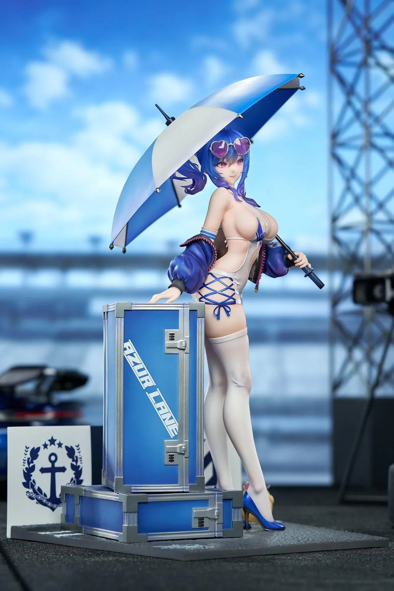 Azur Lane St. Louis Race Queen Ver. 1/7 Scale Figure with blue hair, umbrella, racing outfit, display cases, mascot detail, and bonus item